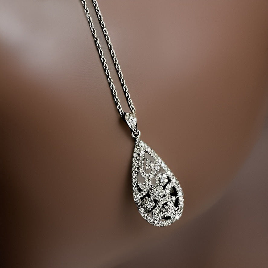 Ernest Jones 9ct White Gold Halo Square Diamond Necklace 0.50ct Half C –  London Diamond Online
