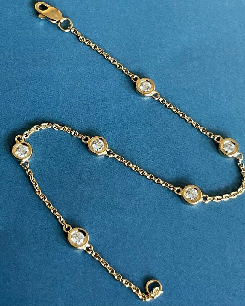 18ct yellow gold diamond bracelet, station chain, by the yard